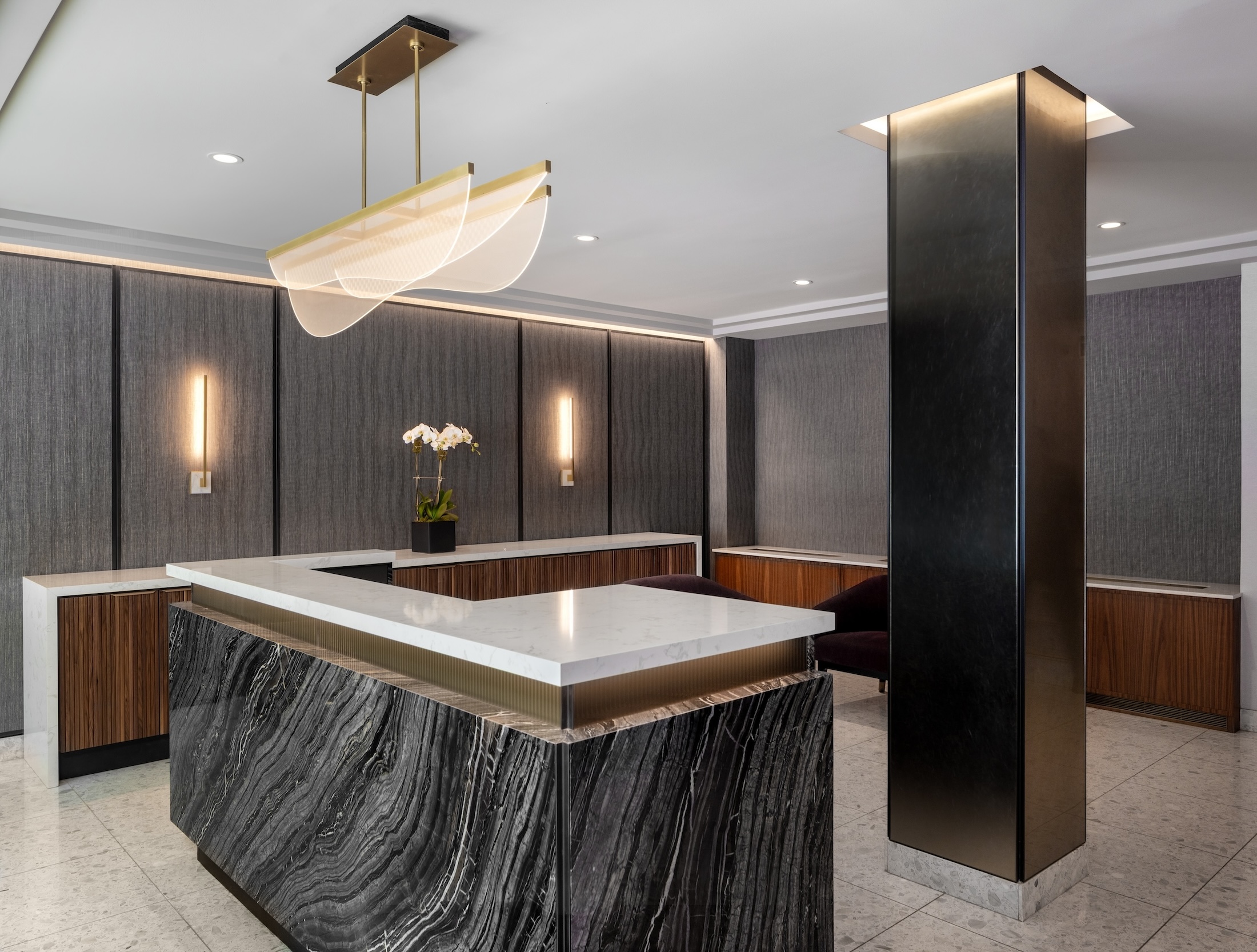 Refreshed lobby walls and trim in an apartment building